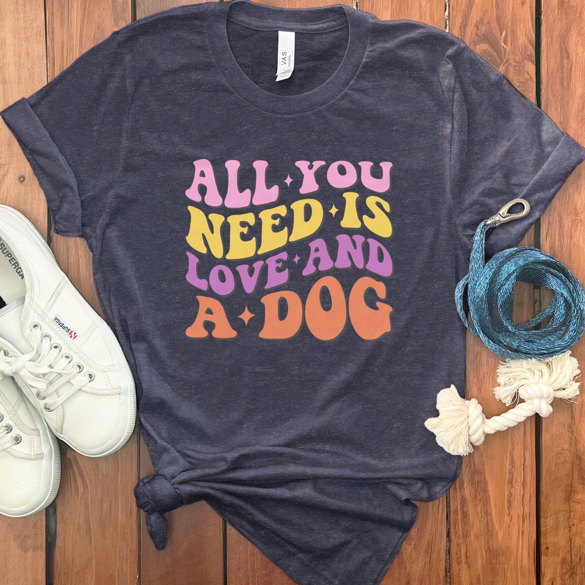 All You Need Is Love and a Dog Graphic T-shirt product type