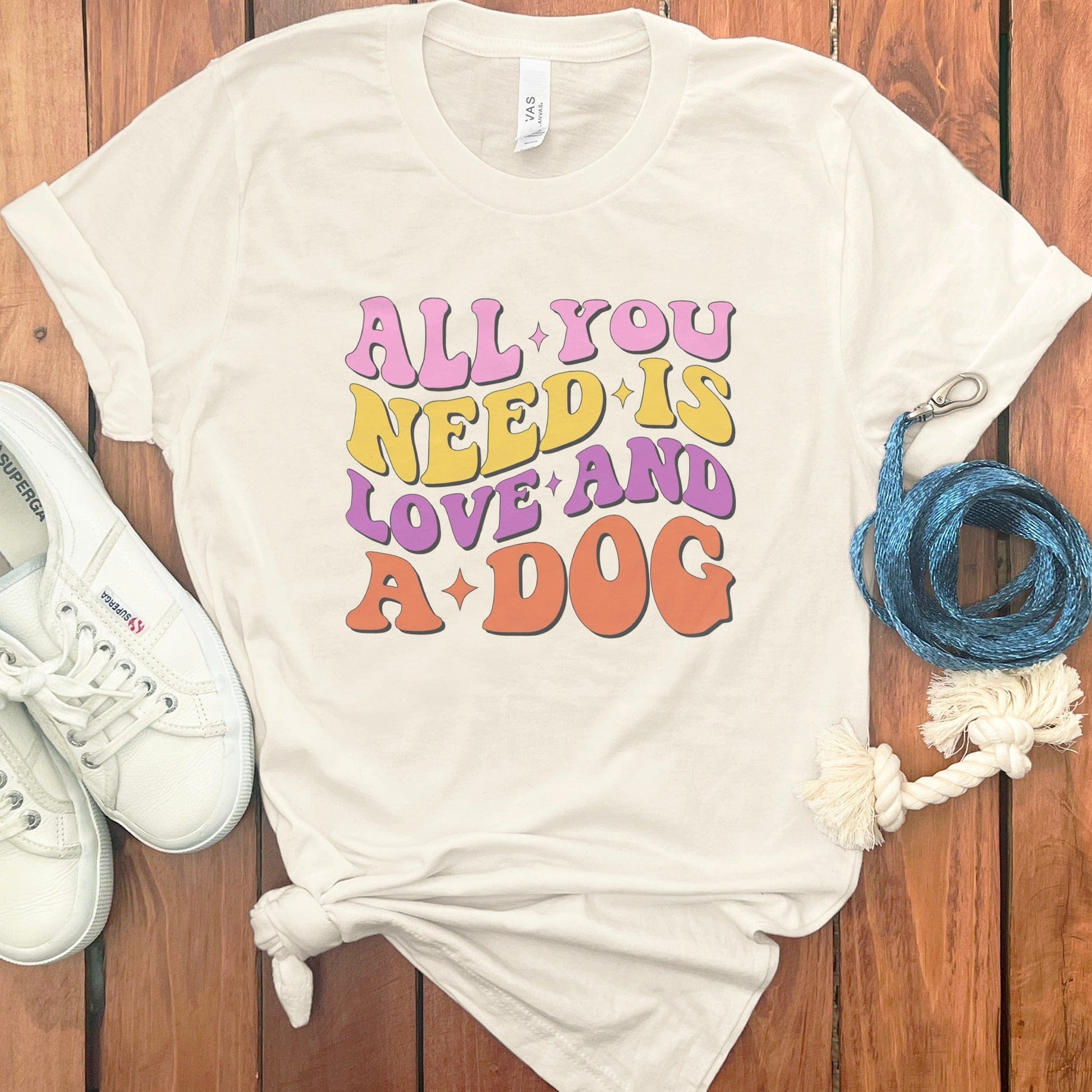 All You Need Is Love and A Dog Graphic Tee product