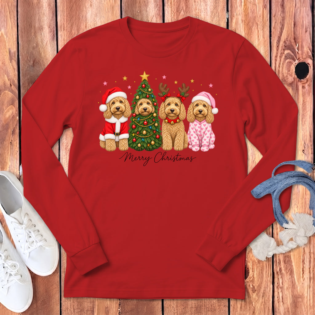 Red long-sleeved shirt featuring a graphic of four doodle dogs in Christmas costumes next to a tree.