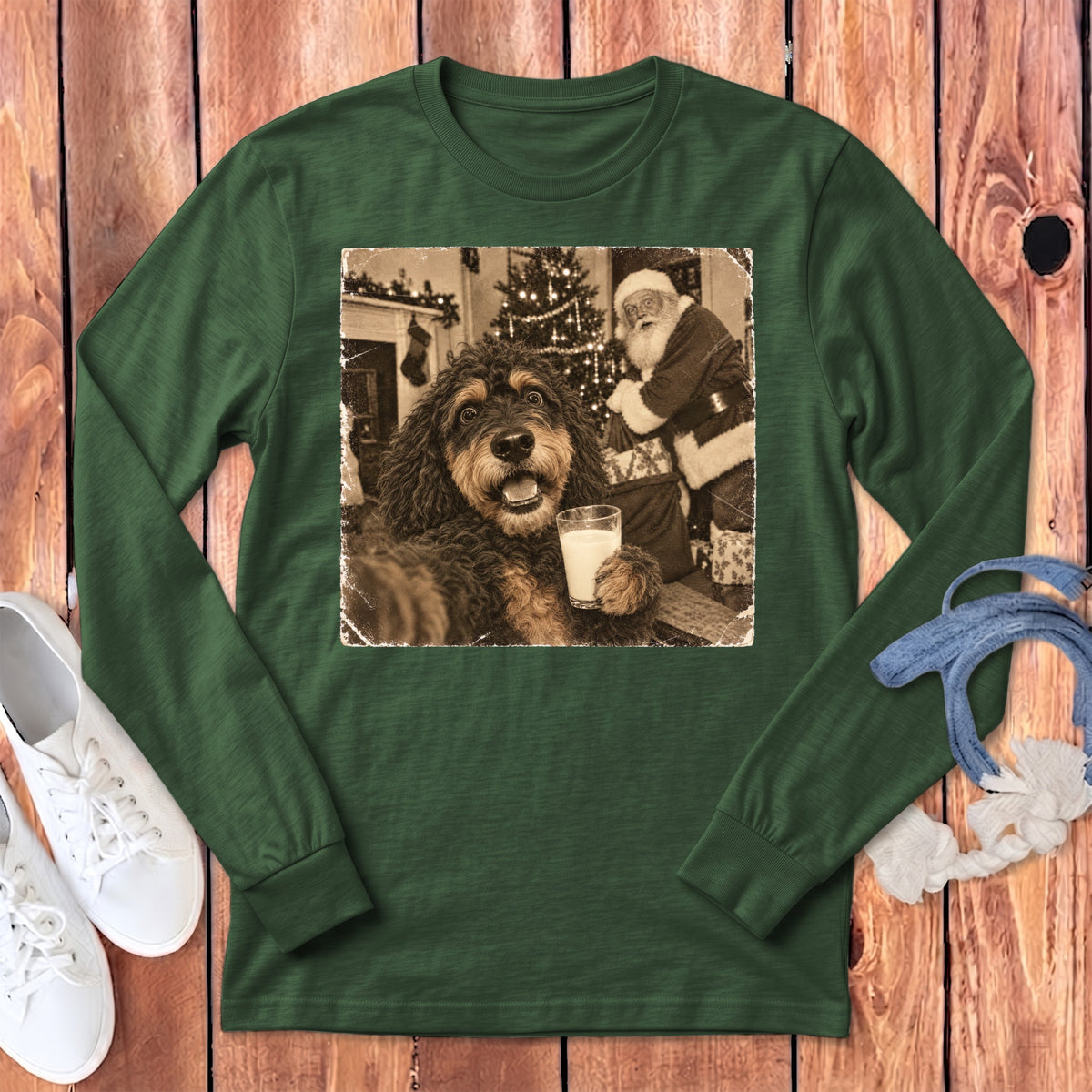 Forest green long-sleeve t-shirt with a vintage graphic of a dog holding a glass of milk next to Santa Claus.