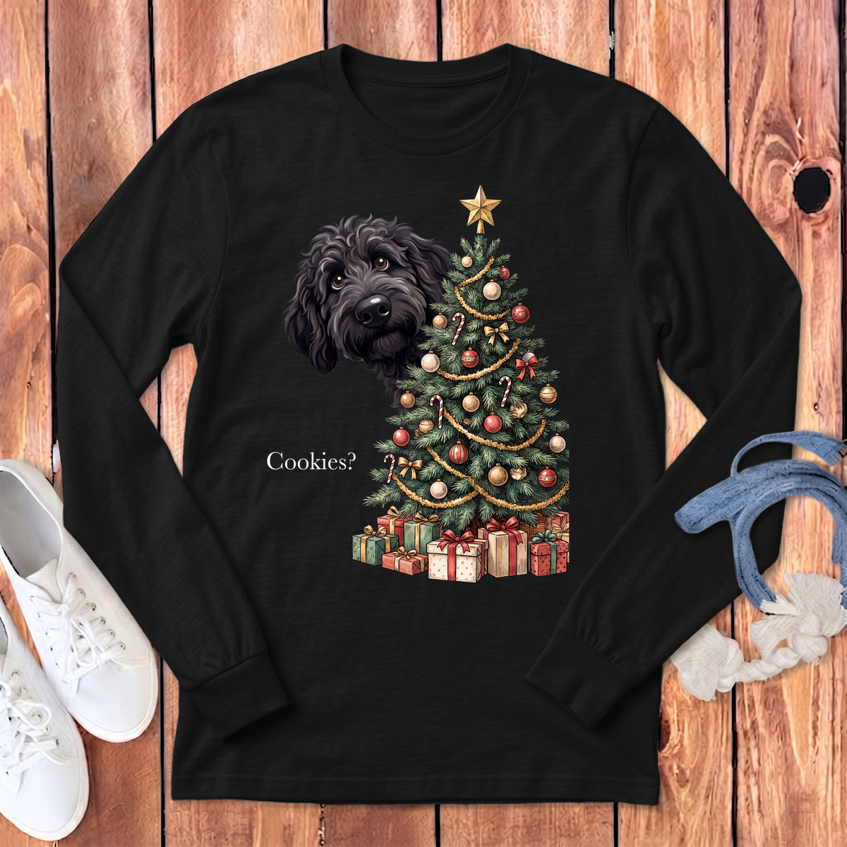 Black long-sleeve shirt with a black dog peeking by a Christmas tree and the text "Cookies?".
