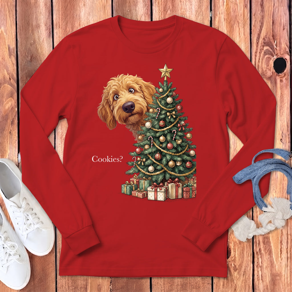 Goldendoodle peeking beside Christmas tree with gifts, text "Cookies?".