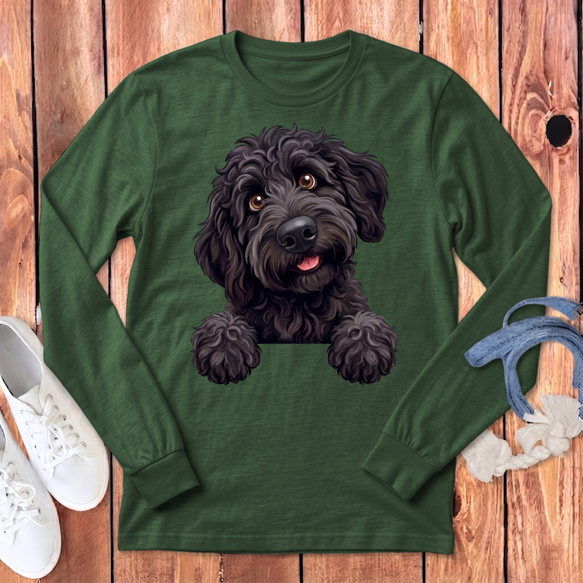 Long sleeve forest green shirt with a black doodle dog graphic design.