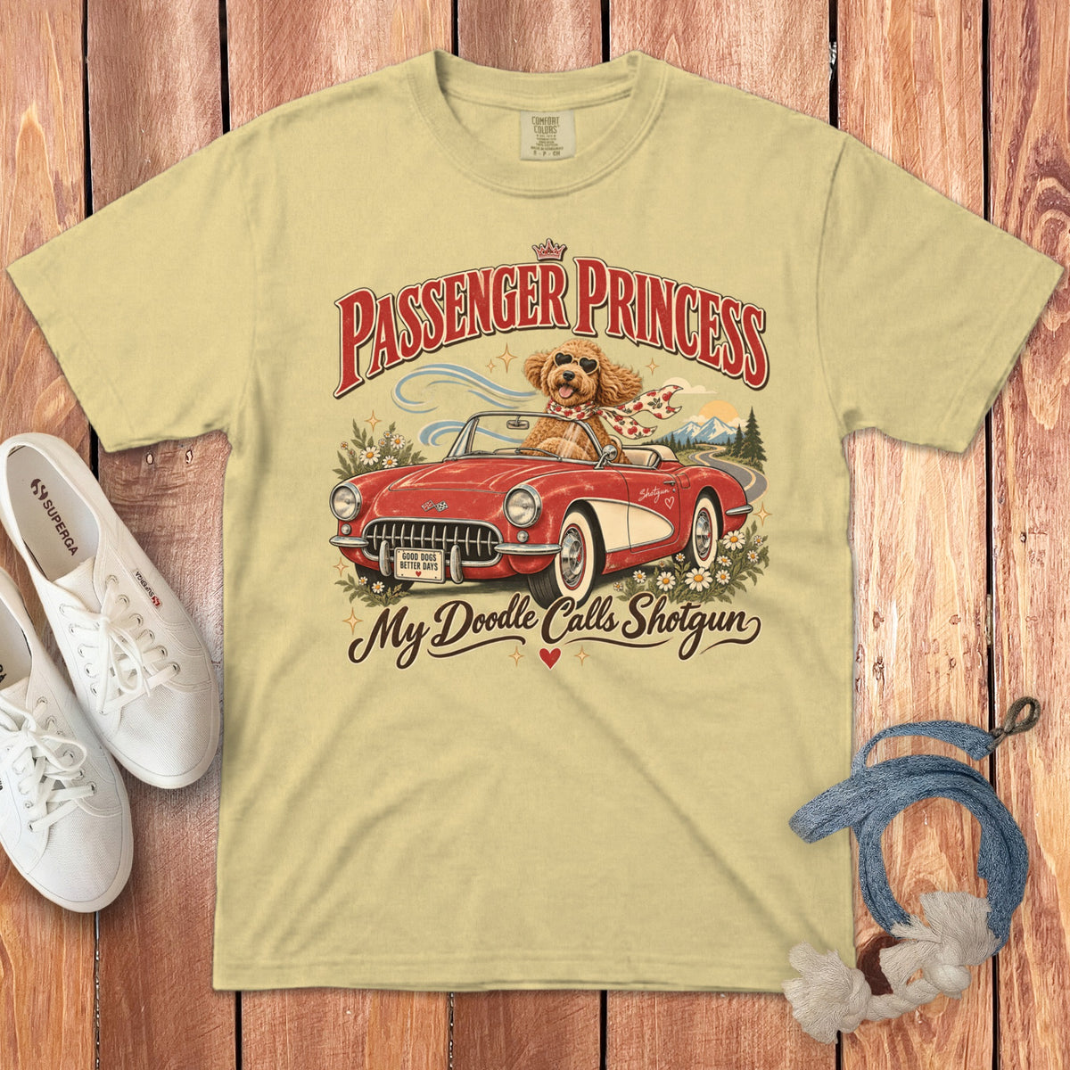 Light yellow t-shirt with "Passenger Princess" and "My Doodle Calls Shotgun" graphics.