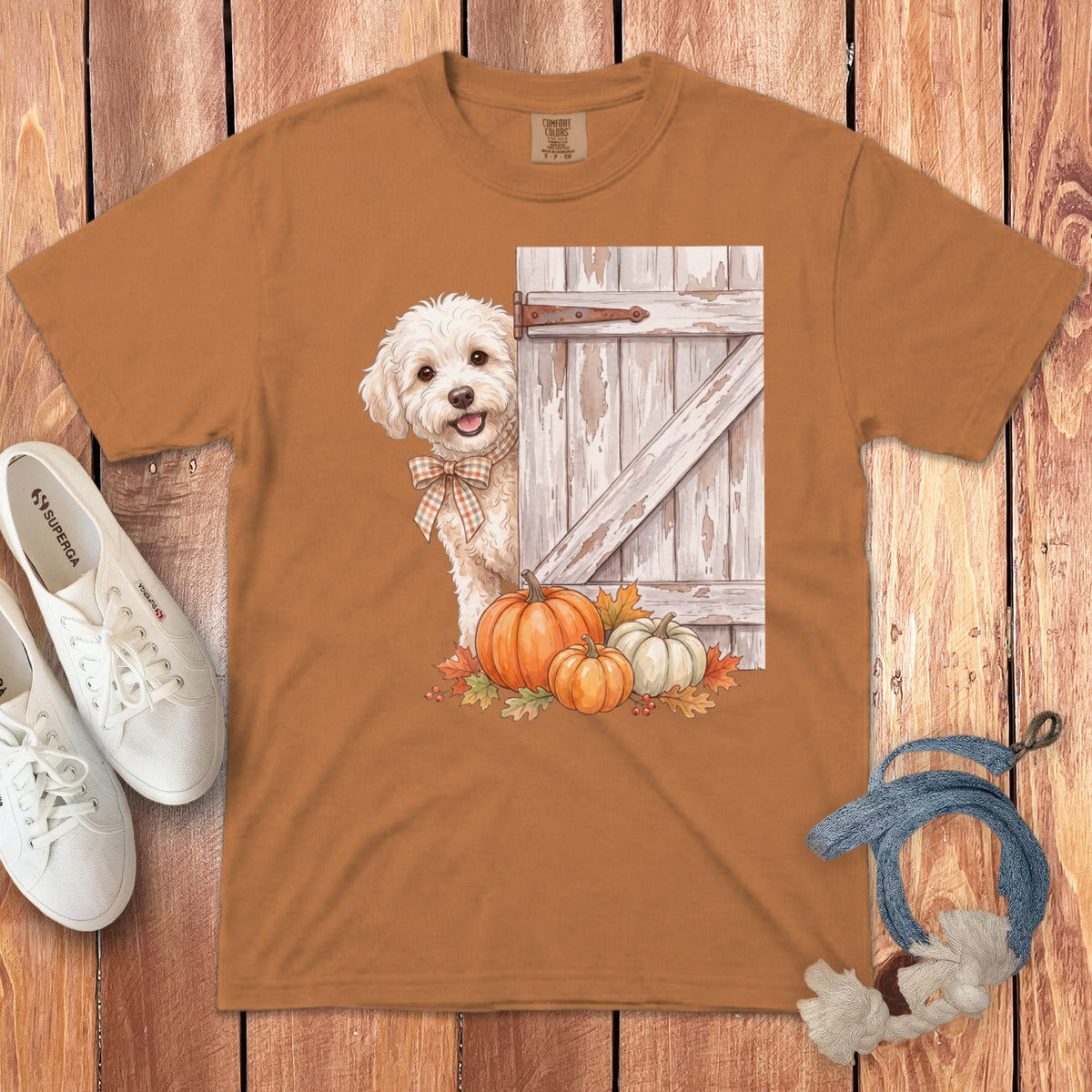 Brown t-shirt with a white dog, barn door, and pumpkins graphic.