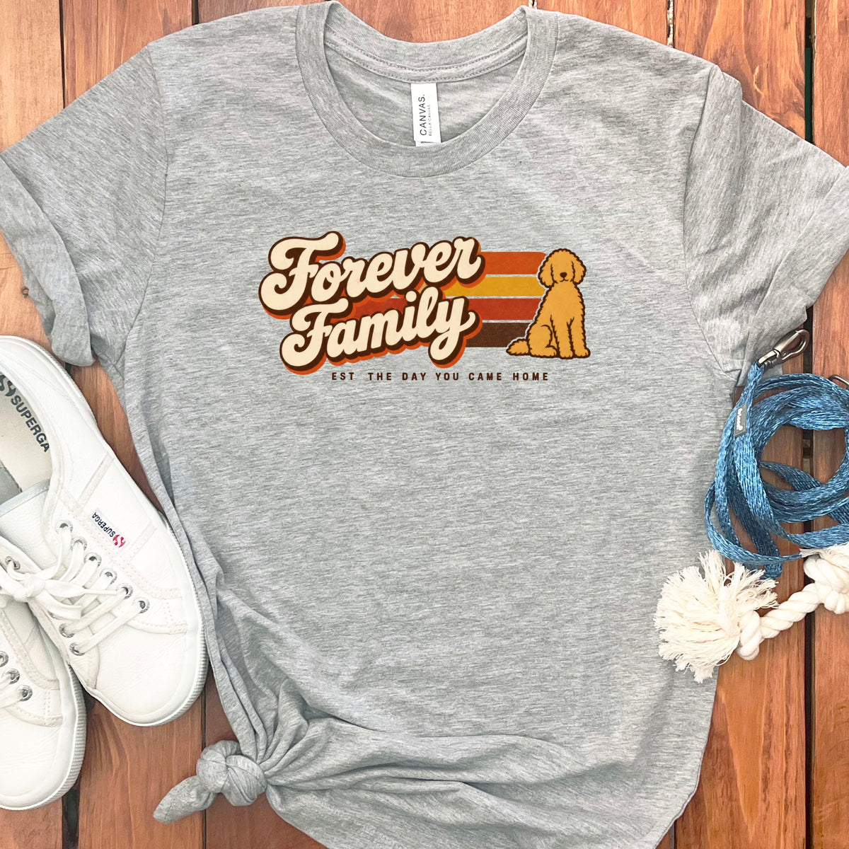 Grey t-shirt with "Forever Family" text and a dog illustration.