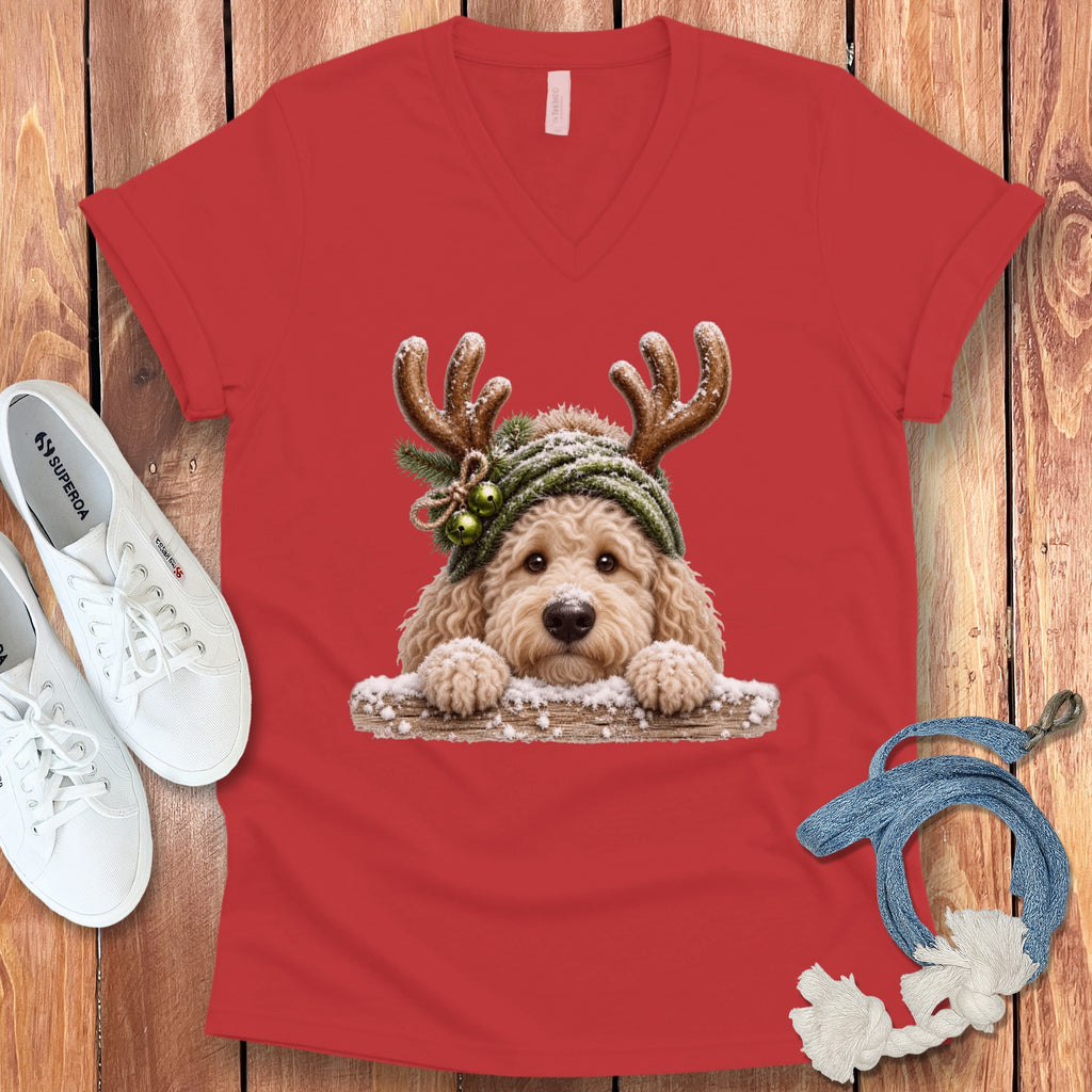 Red v-neck t-shirt with a doodle dog wearing reindeer antlers.