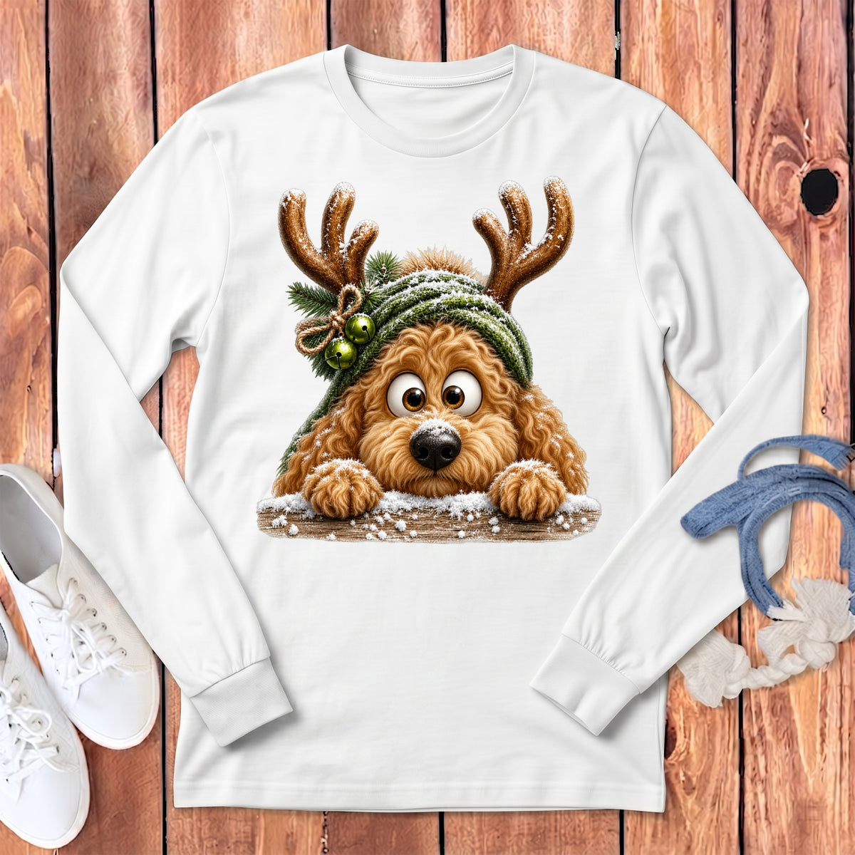 Long sleeve white t-shirt with a cartoon dog wearing reindeer antlers and a hat.