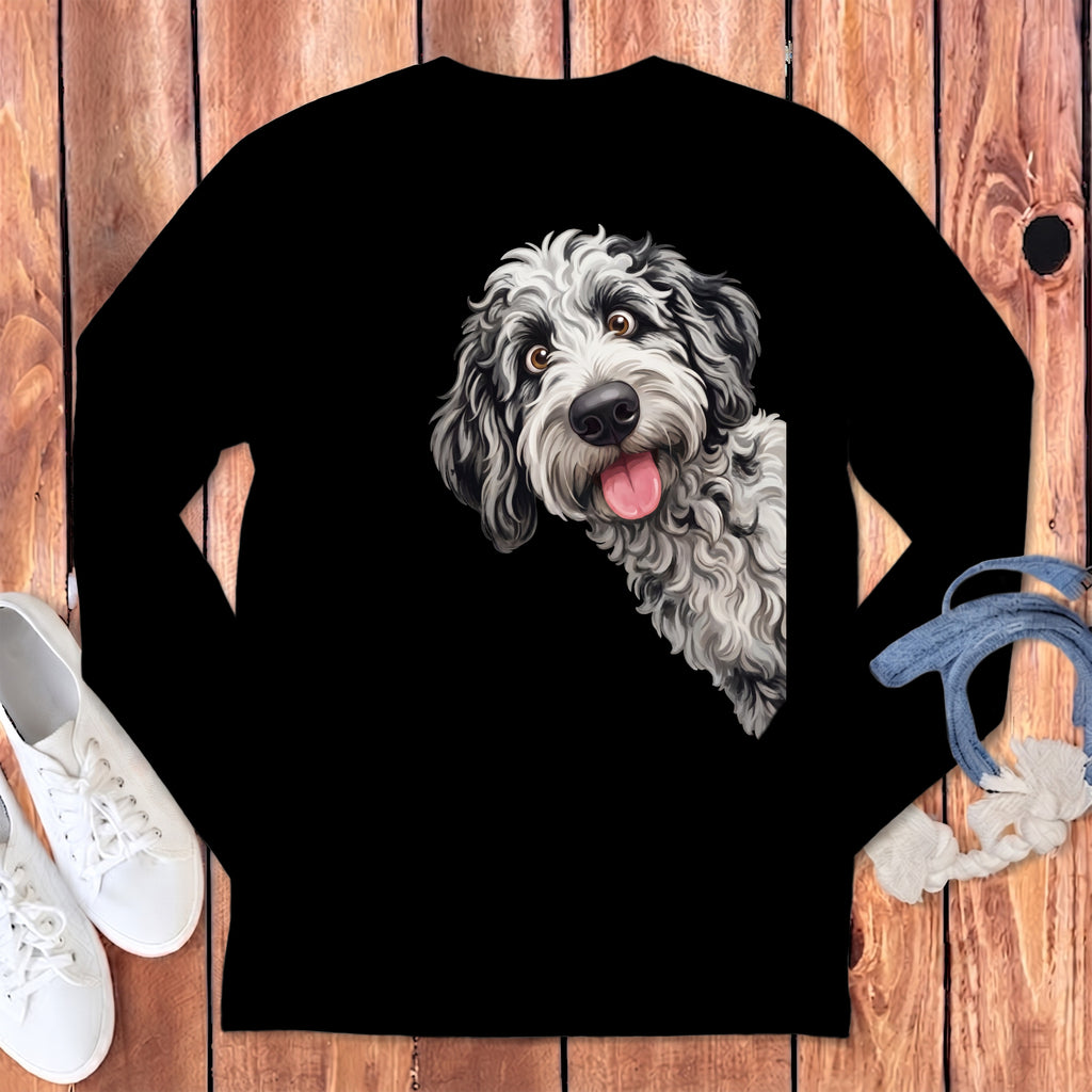 Black long-sleeved shirt with a playful doodle of a black and white dog.