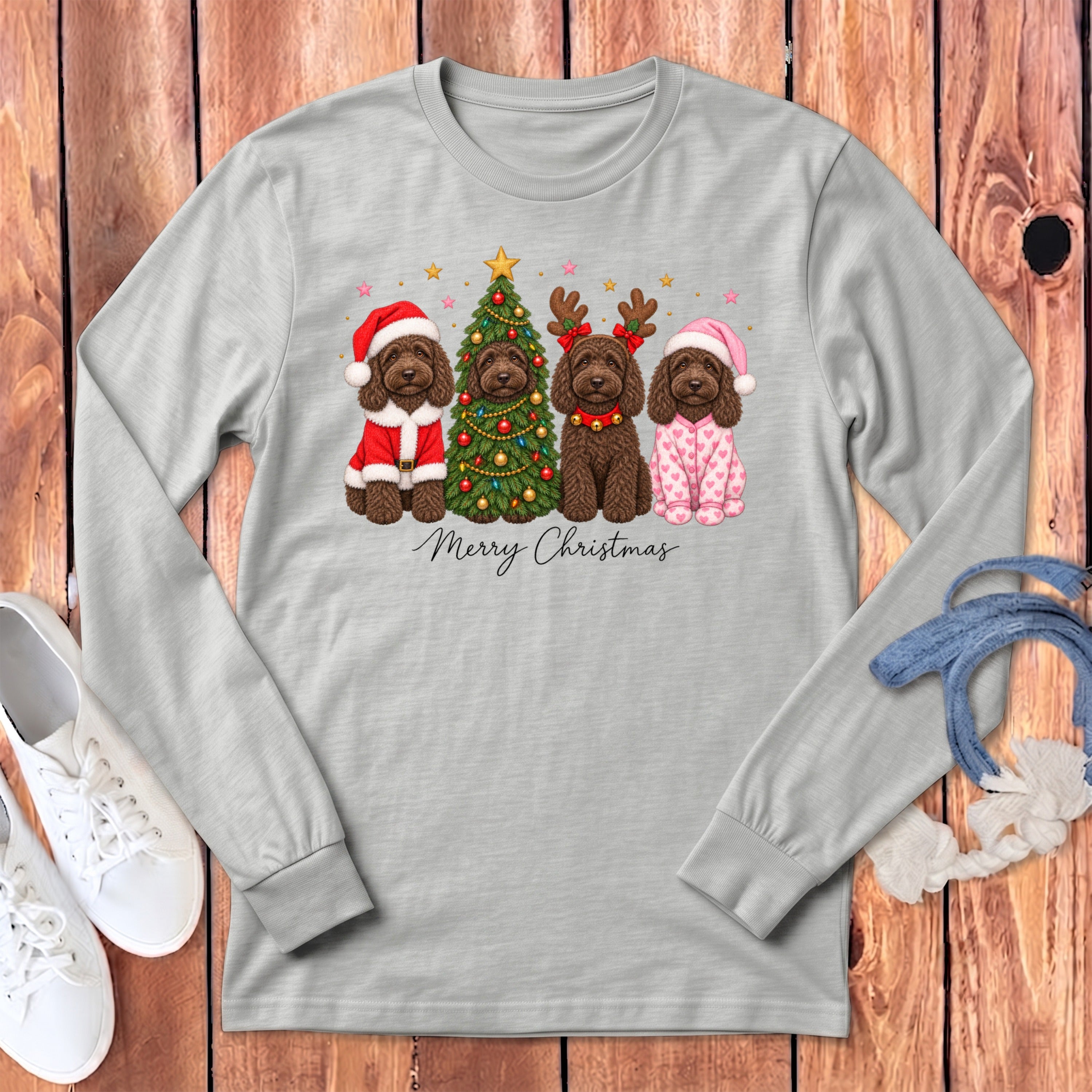 Light gray long-sleeve t-shirt with a Christmas graphic of four brown dogs and the text Merry Christmas.
