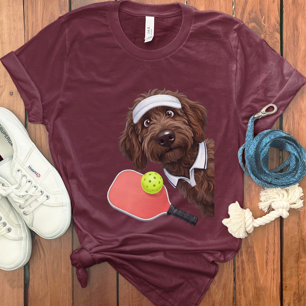 Chocolate Goldendoodle Pickleball Player T-Shirt in Maroon / S by Puppy Jo