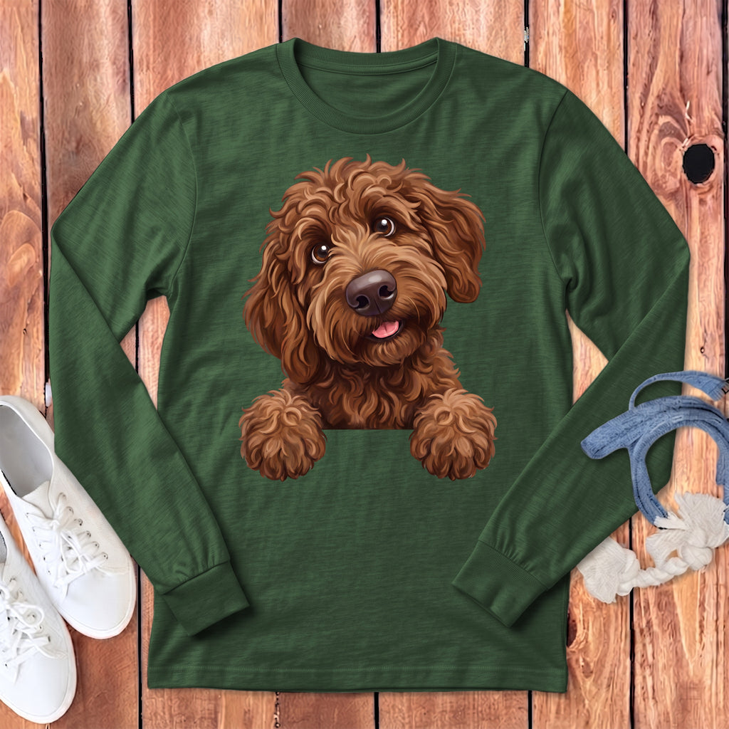 Green long-sleeve shirt with a brown doodle dog illustration peeking out.