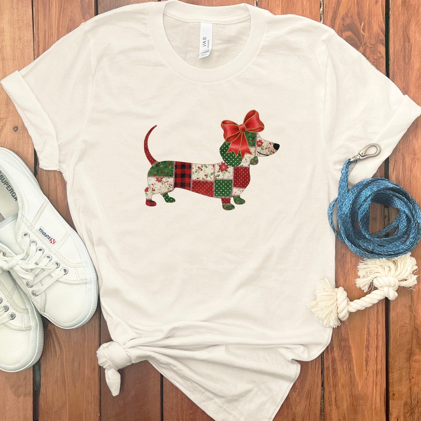 Festive Dog with Bow Graphic T-shirt product type