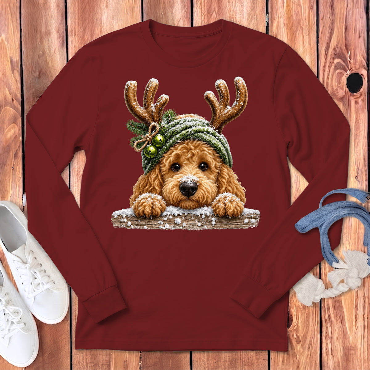 Maroon long-sleeve shirt with a festive dog wearing antlers and a beanie.