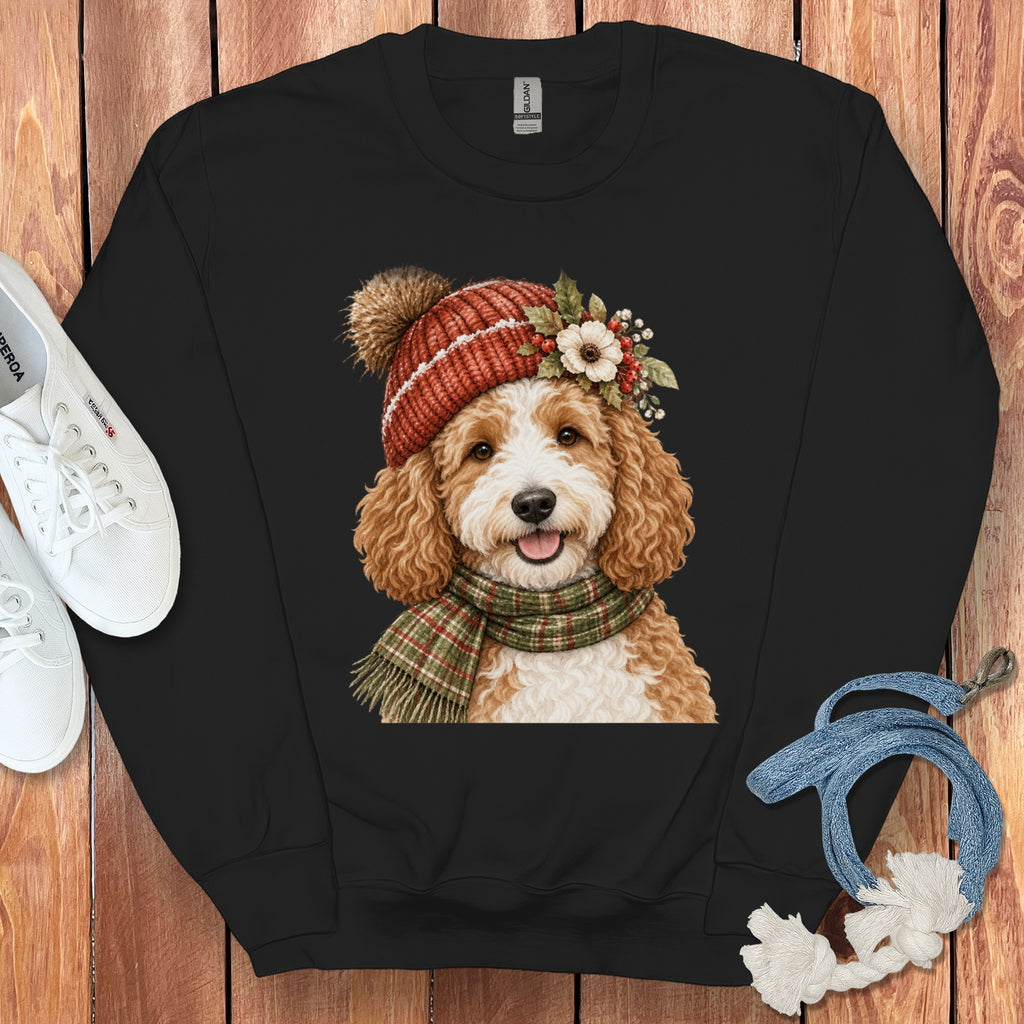 Black sweatshirt with watercolor illustration of a goldendoodle wearing a hat and scarf.