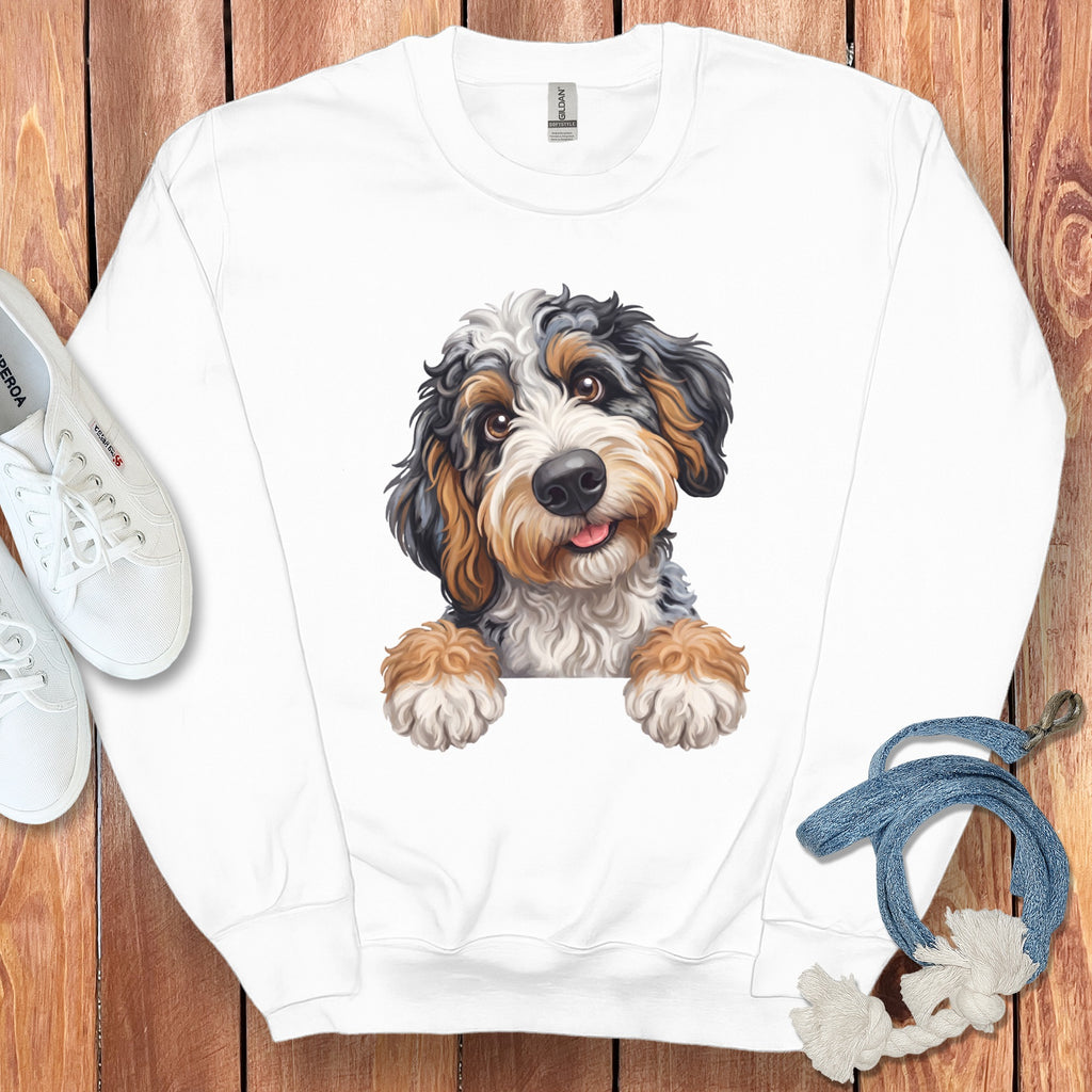 White crewneck sweatshirt with a colorful cartoon dog illustration on the front.
