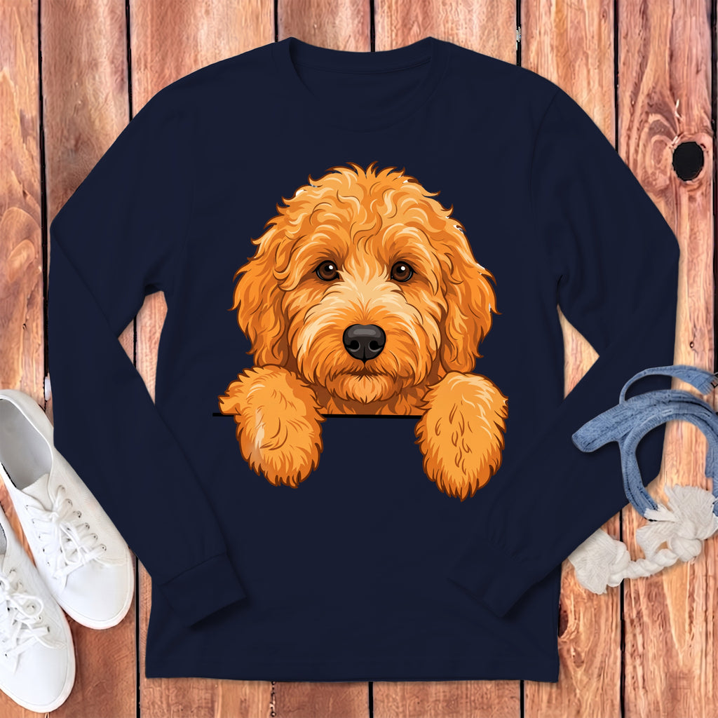 Navy long-sleeve shirt with an orange doodle dog illustration peeking over the collar.