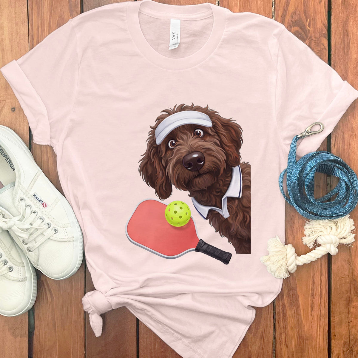Chocolate Goldendoodle Pickleball Player T-Shirt in Soft Pink / S by Puppy Jo