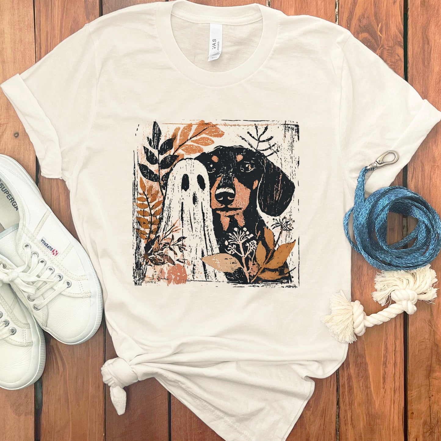 Cozy Halloween Dog and Ghost Graphic Tee product