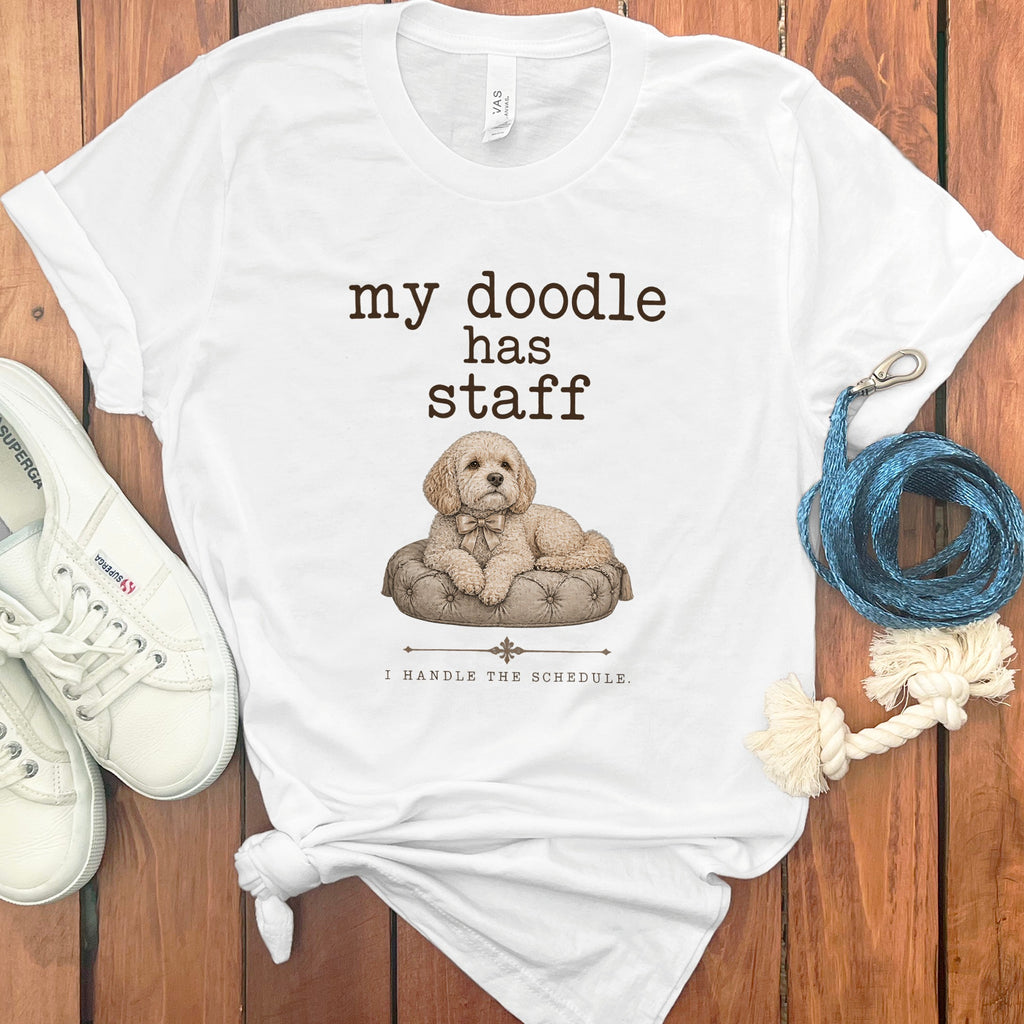 White t-shirt with "my doodle has staff I handle the schedule" and dog illustration.