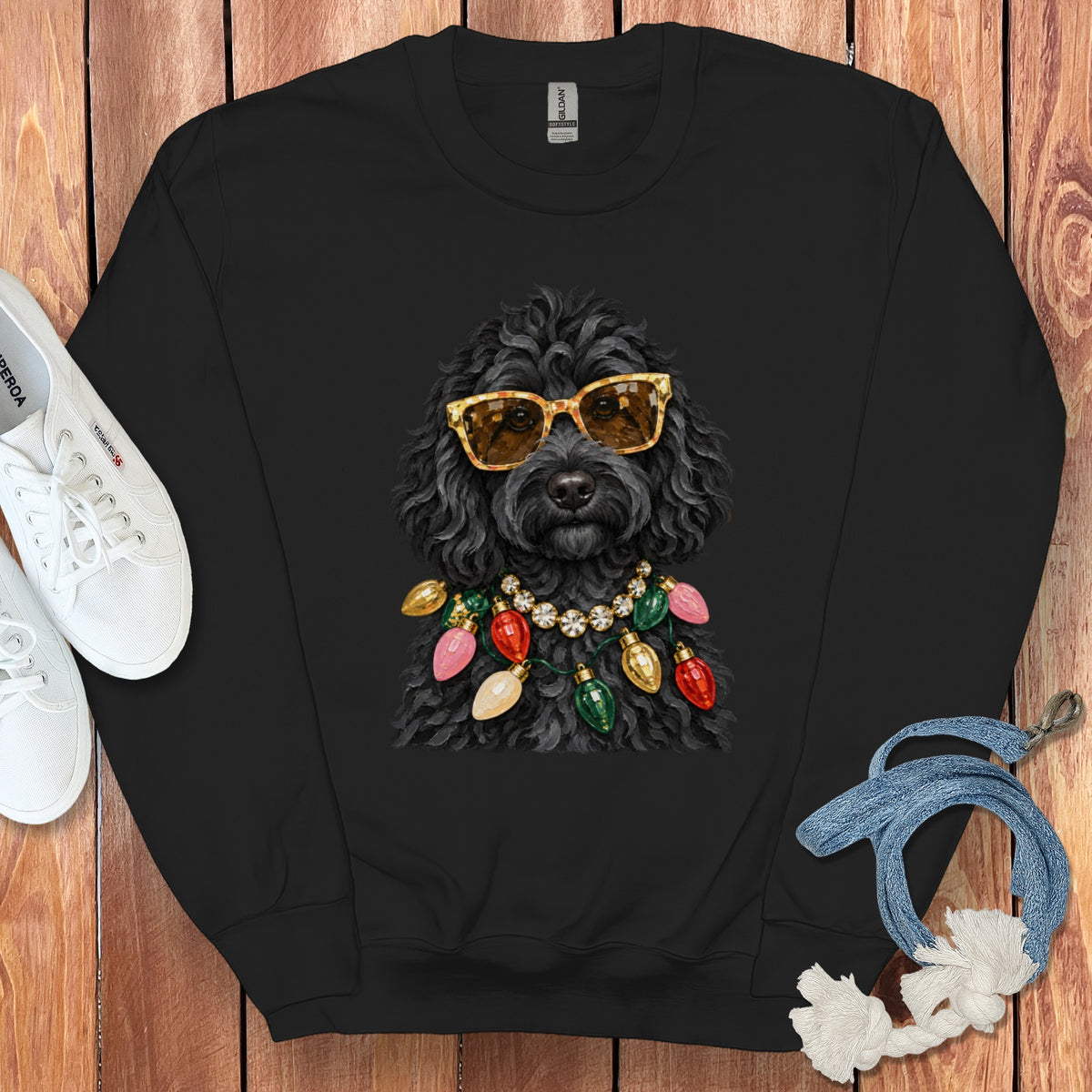 Black crewneck sweatshirt with a graphic of a black dog wearing sunglasses and Christmas lights.