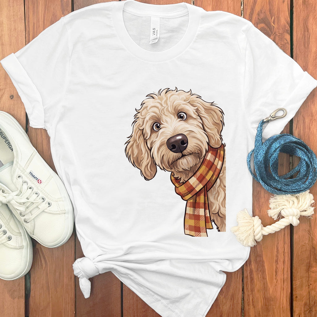 White t-shirt with a cartoon doodle dog wearing a plaid scarf.