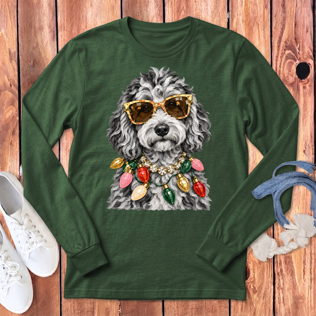 Long-sleeve green t-shirt with a doodle dog wearing sunglasses and Christmas lights.