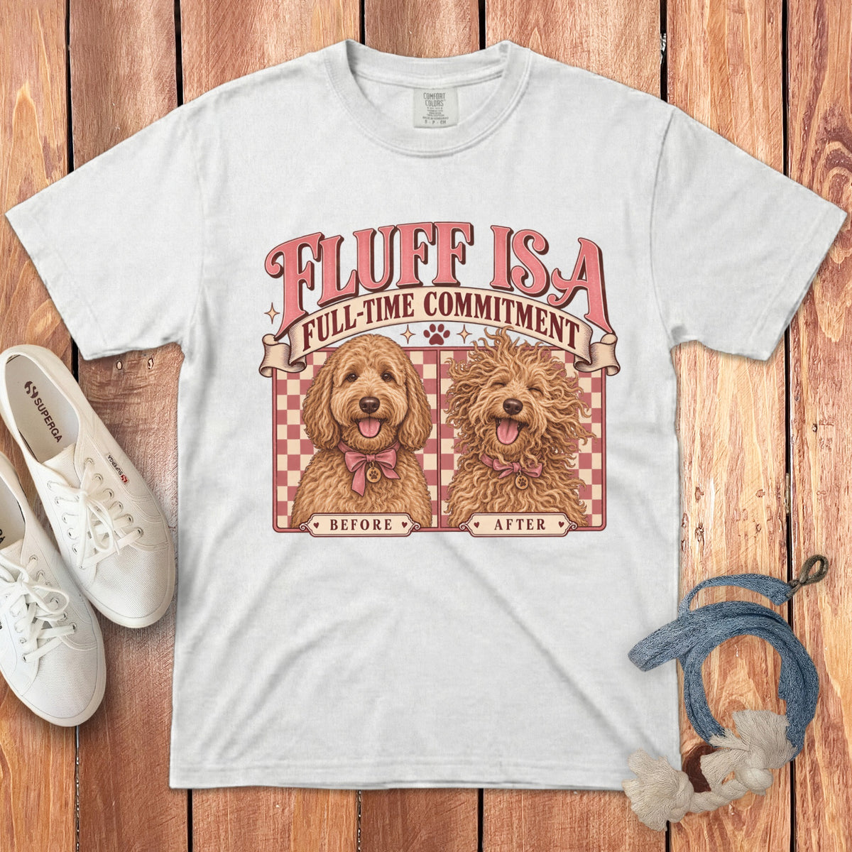 White crewneck t-shirt featuring graphic text and illustrations of a golden doodle before and after grooming.