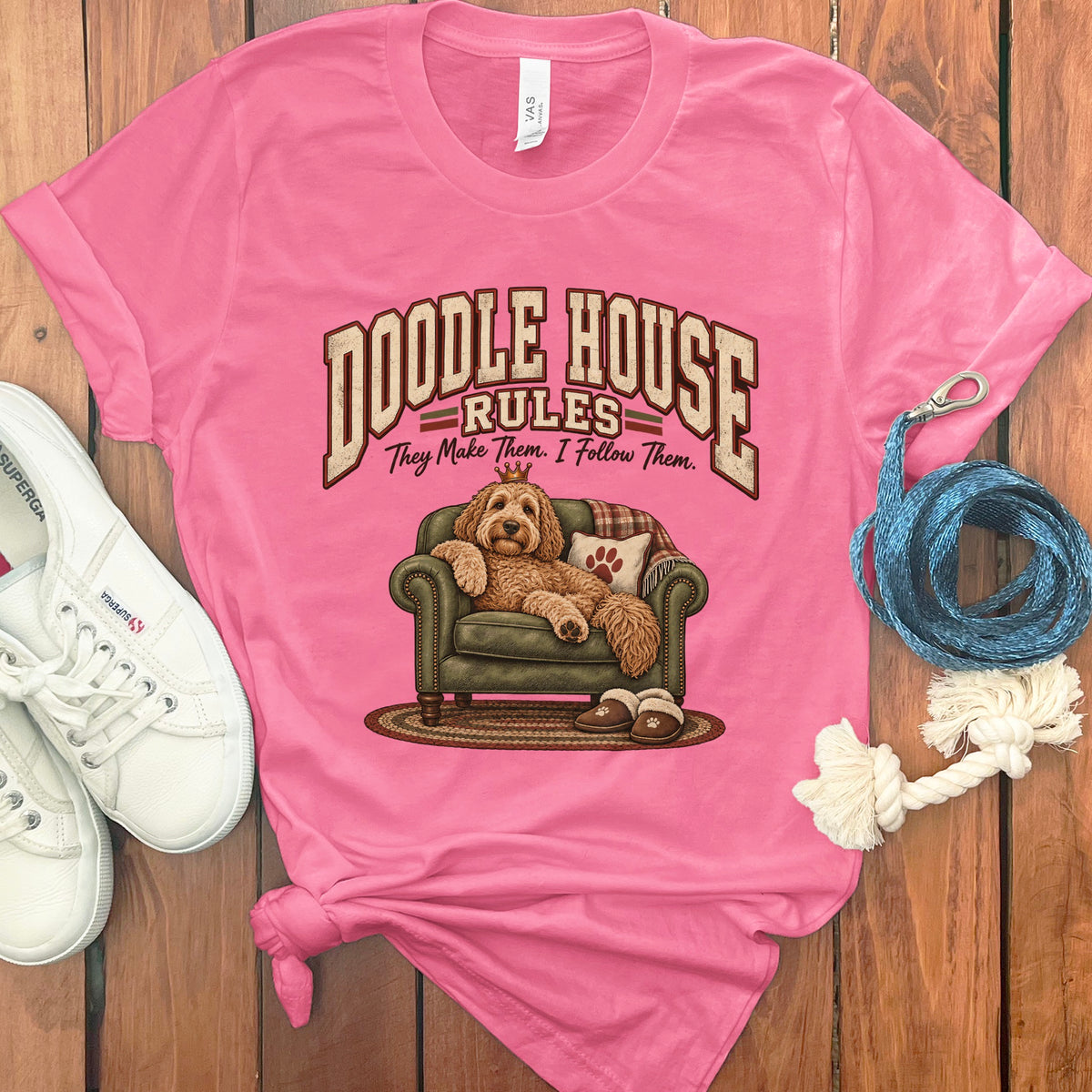Pink t-shirt with graphic: "Doodle House Rules: They Make Them, I Follow Them."