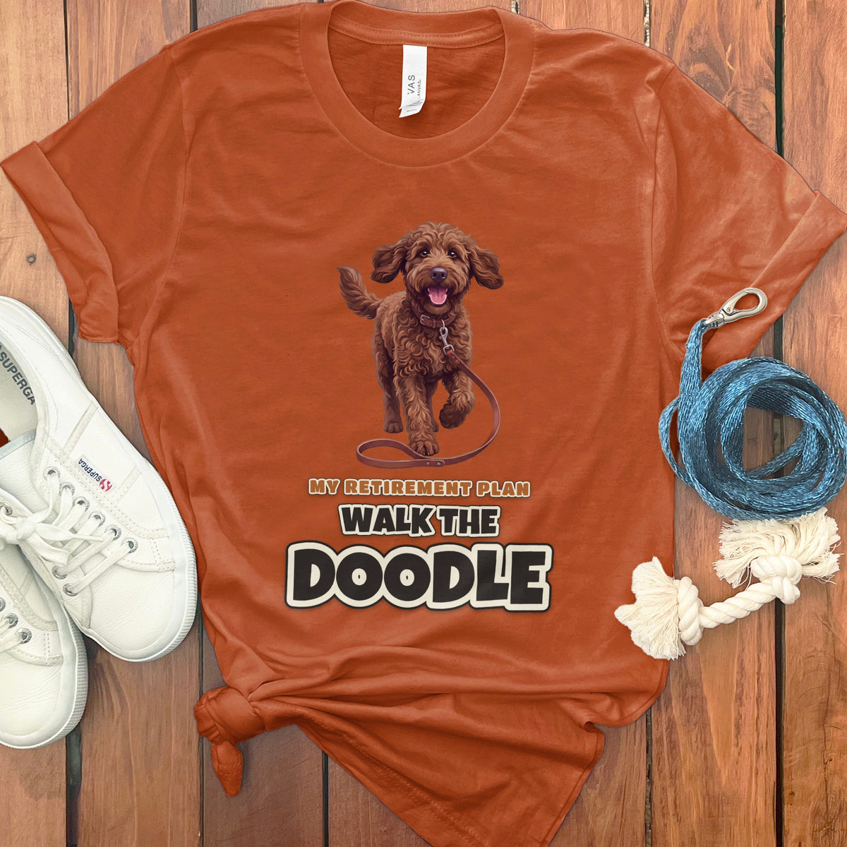 Brown doodle dog graphic with text "MY RETIREMENT PLAN WALK THE DOODLE".