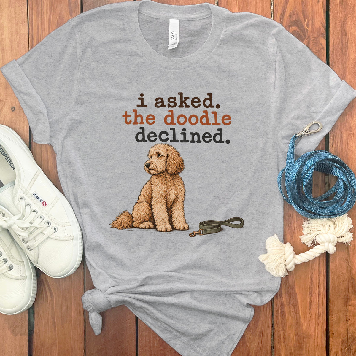 Grey t-shirt with doodle dog illustration and text: "i asked. the doodle declined."