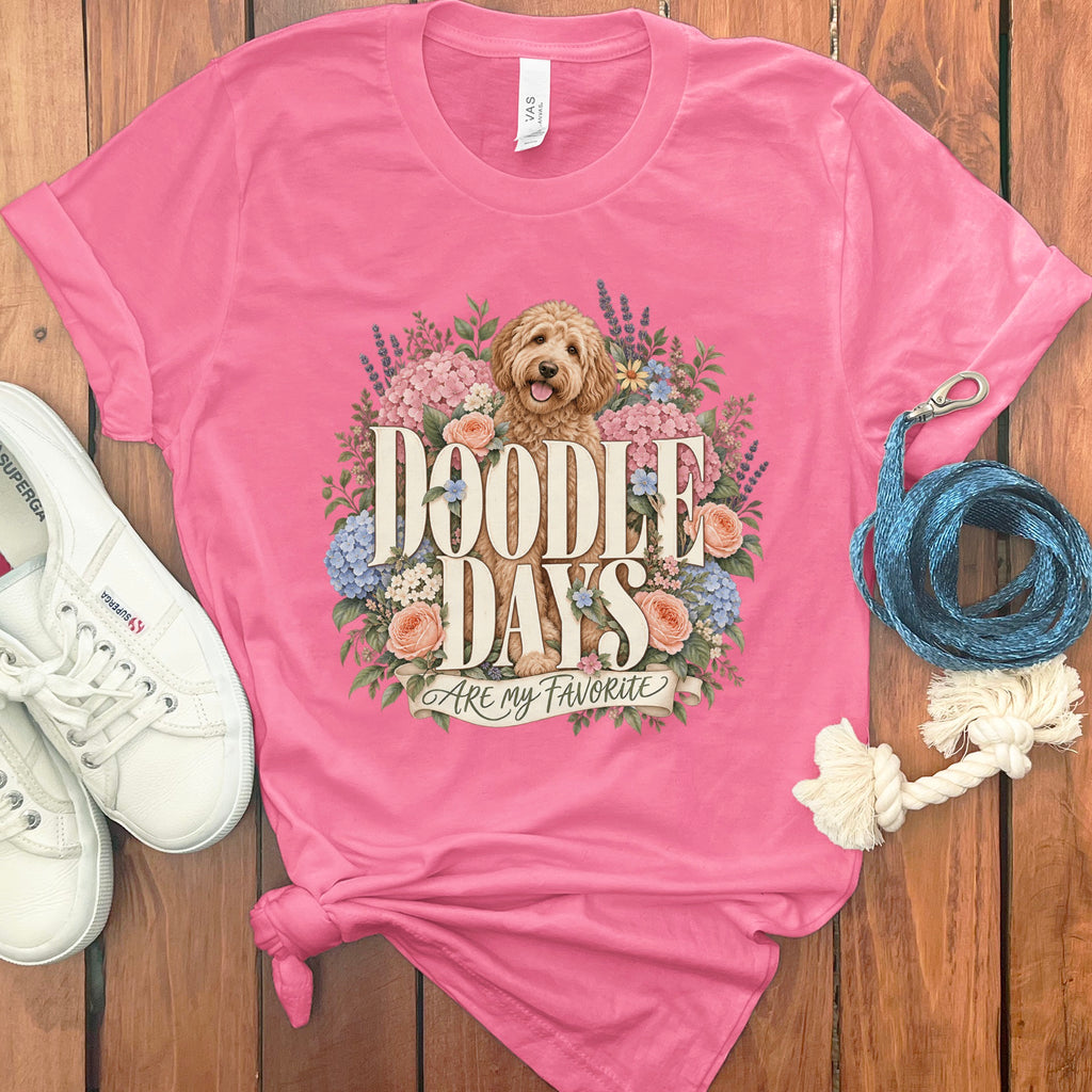 Pink t-shirt with a doodle dog and floral graphic saying "Doodle Days Are My Favorite".