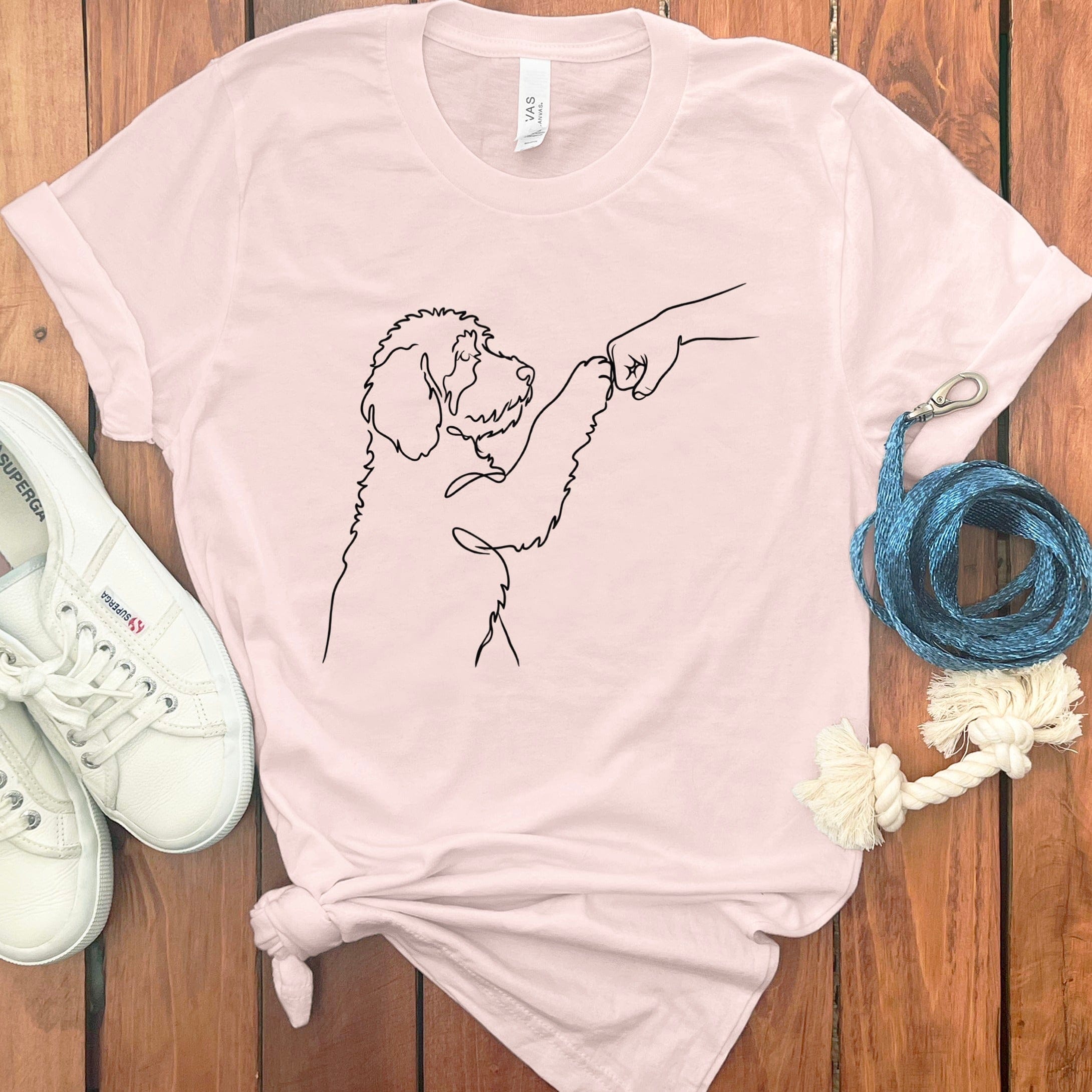 Cute Pink T-Shirt with Dog and Human Fist Bump Design