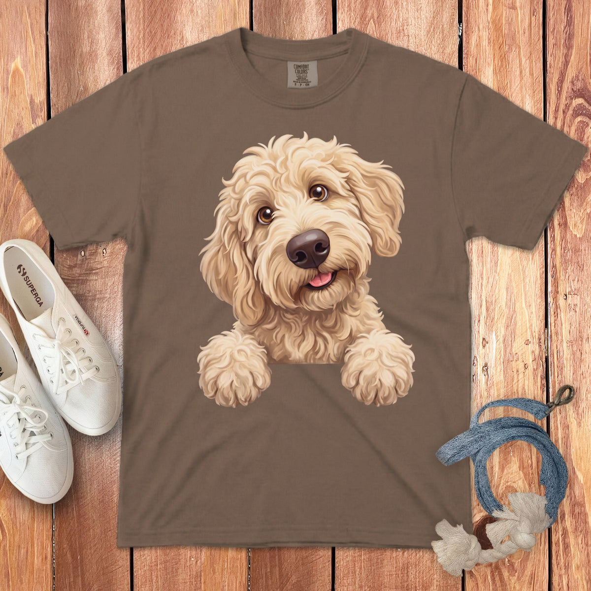 Brown t-shirt featuring a fluffy golden doodle puppy illustration.