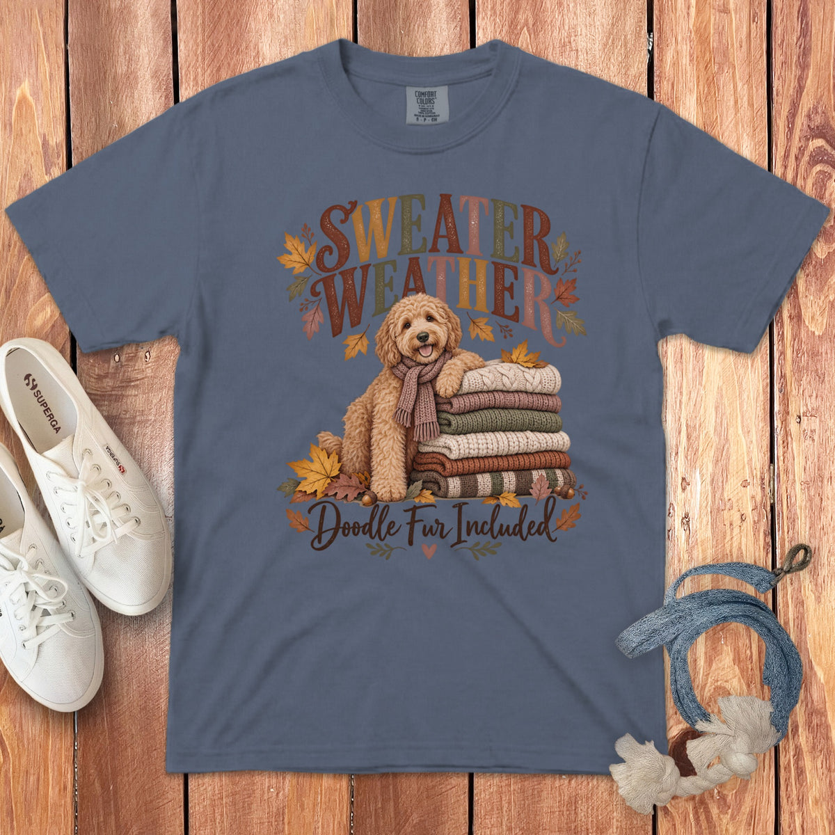 Blue t-shirt with "Sweater Weather" and "Doodle Fur Included" text.