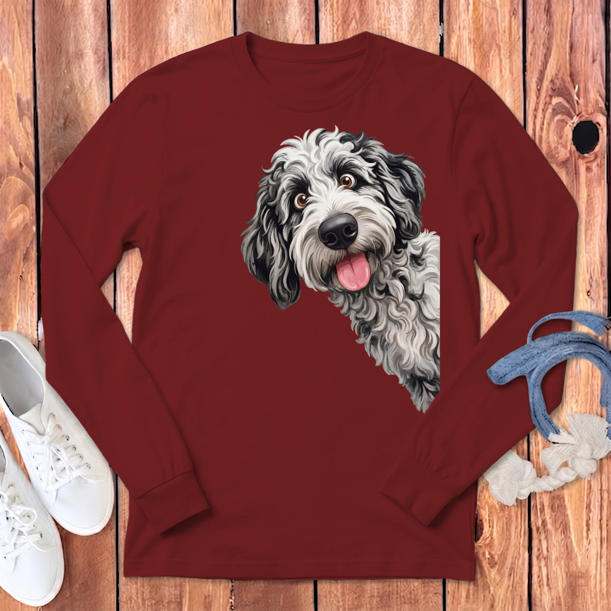 Maroon long-sleeve shirt with a black and white fluffy dog graphic.