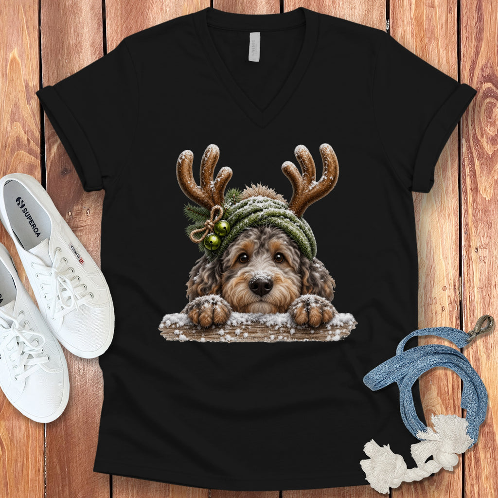 Black t-shirt with a doodle dog wearing antlers and a snow-covered beanie.