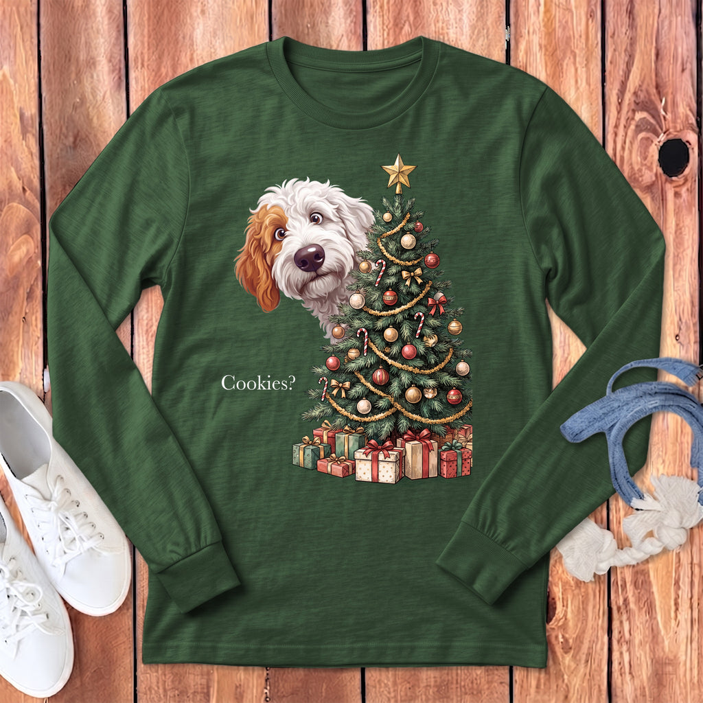 Dog peeking out from behind a Christmas tree with presents and text "Cookies?".