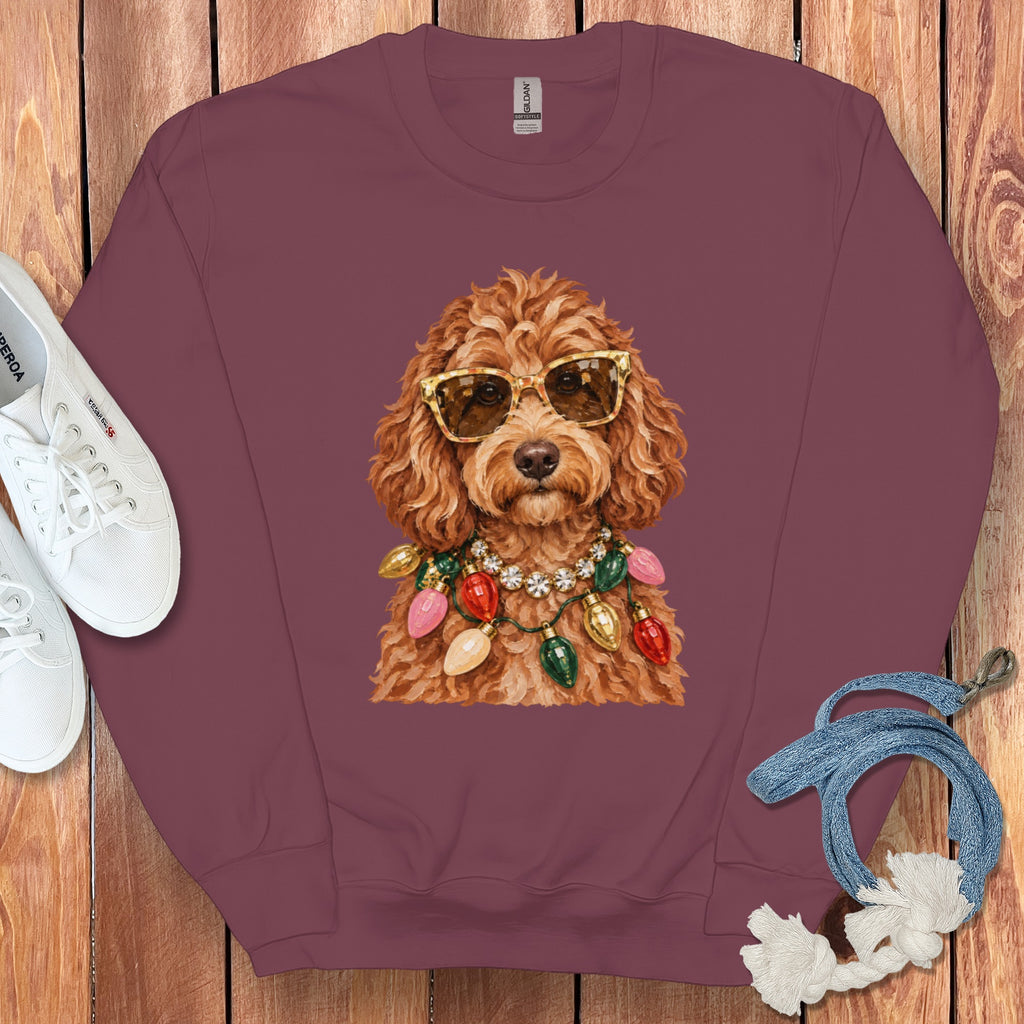 Maroon sweatshirt with illustrated dog wearing sunglasses and Christmas lights.