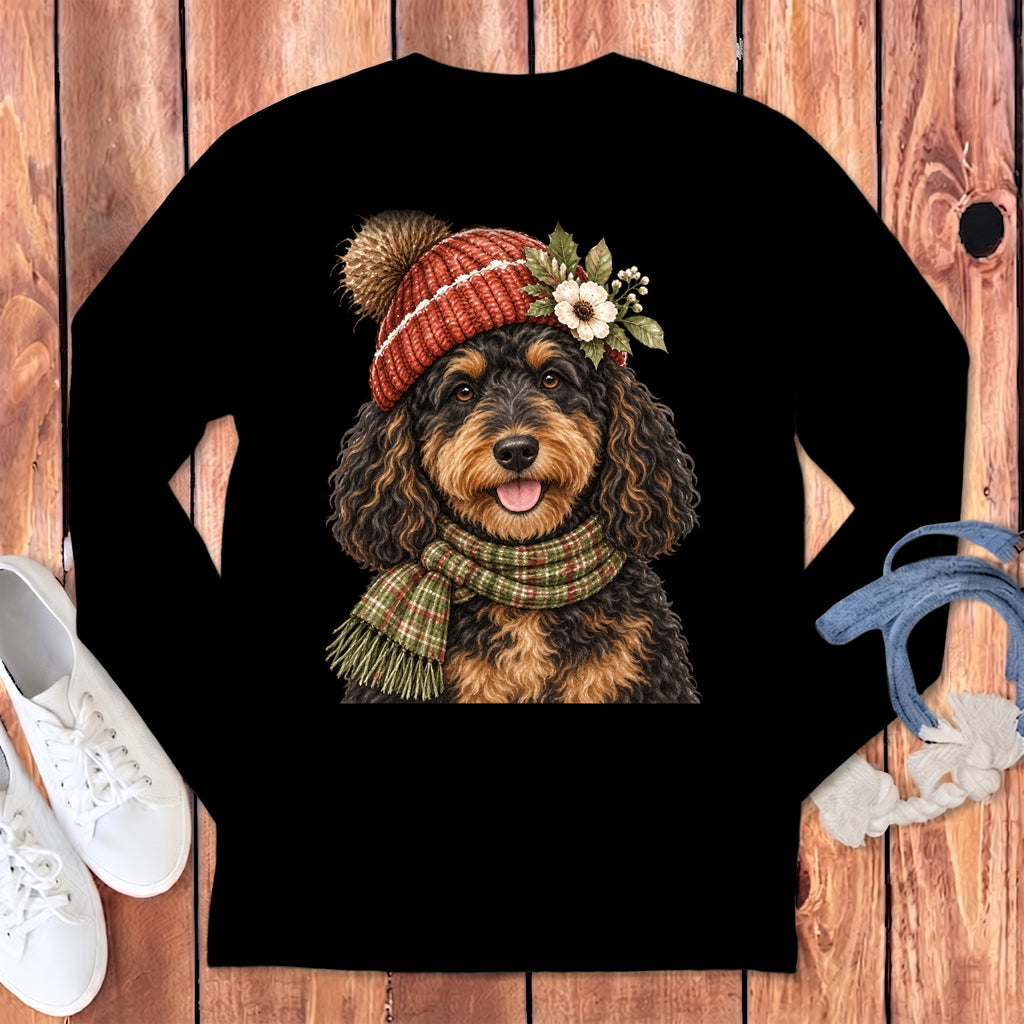 Black long sleeve shirt with a watercolor doodle dog wearing a knitted hat and scarf.