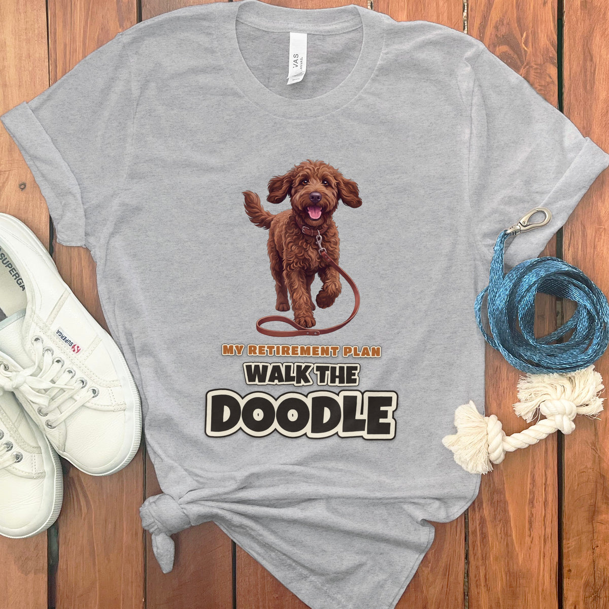 Grey t-shirt with a brown doodle dog and text "My Retirement Plan Walk the Doodle".