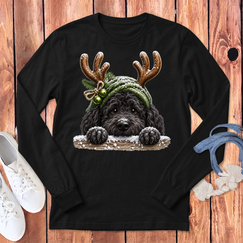 Black long-sleeve t-shirt featuring a fluffy black dog wearing reindeer antlers and a green hat.