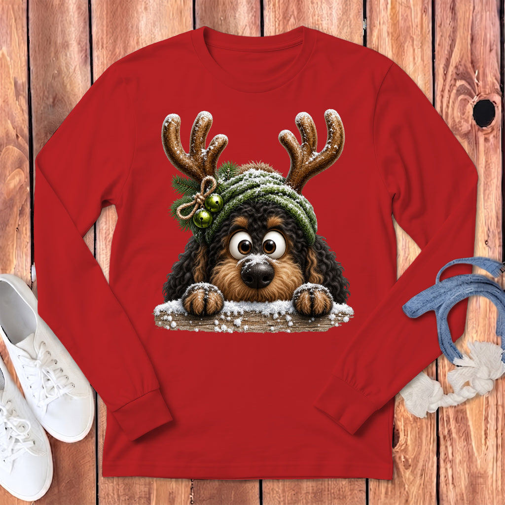 Red long sleeve shirt with cartoon dog wearing antlers and a winter hat.