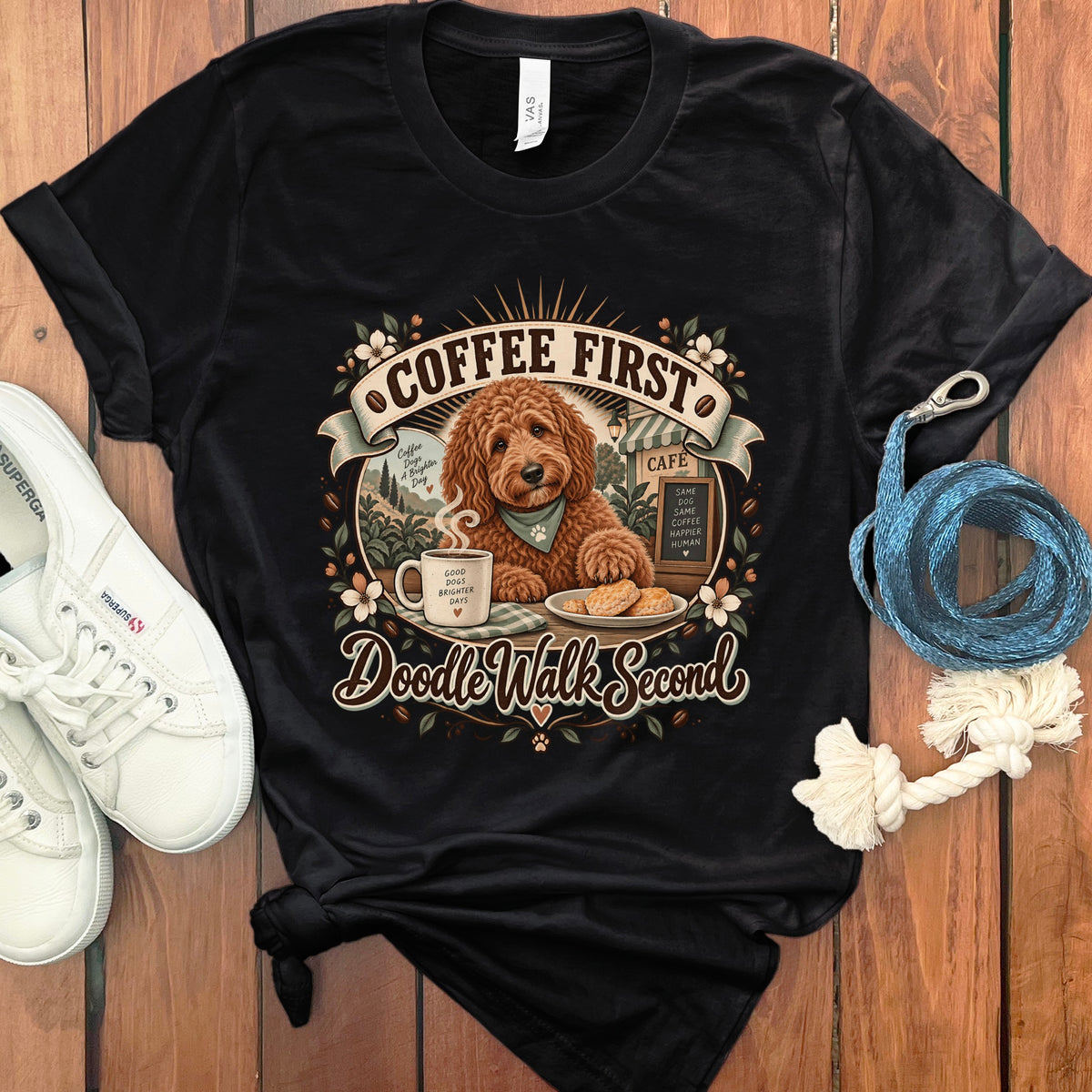 Black t-shirt with "Coffee First, Doodle Walk Second" graphic featuring a dog.