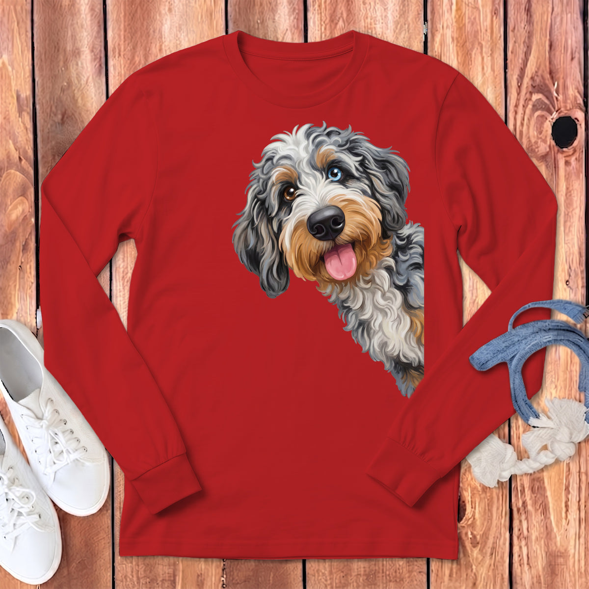 Red long-sleeved shirt with a doodle-style dog illustration on the front.