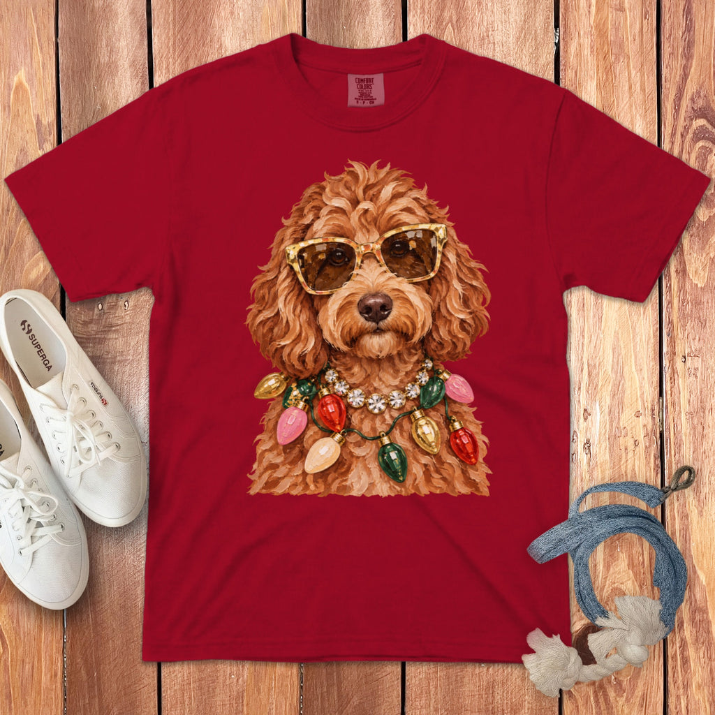 Red t-shirt with a fluffy dog wearing sunglasses and Christmas lights.