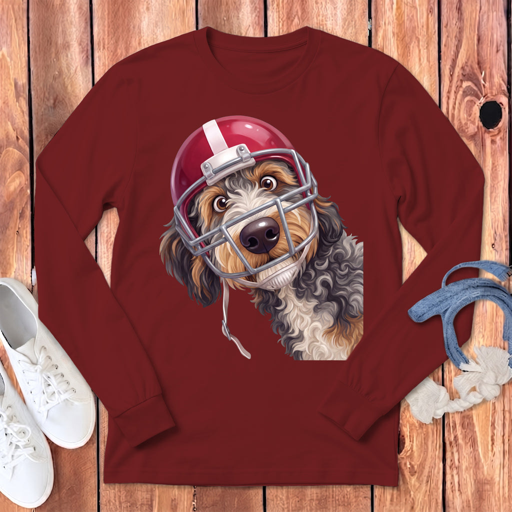 Long sleeve maroon shirt with a doodle-style dog in a football helmet.