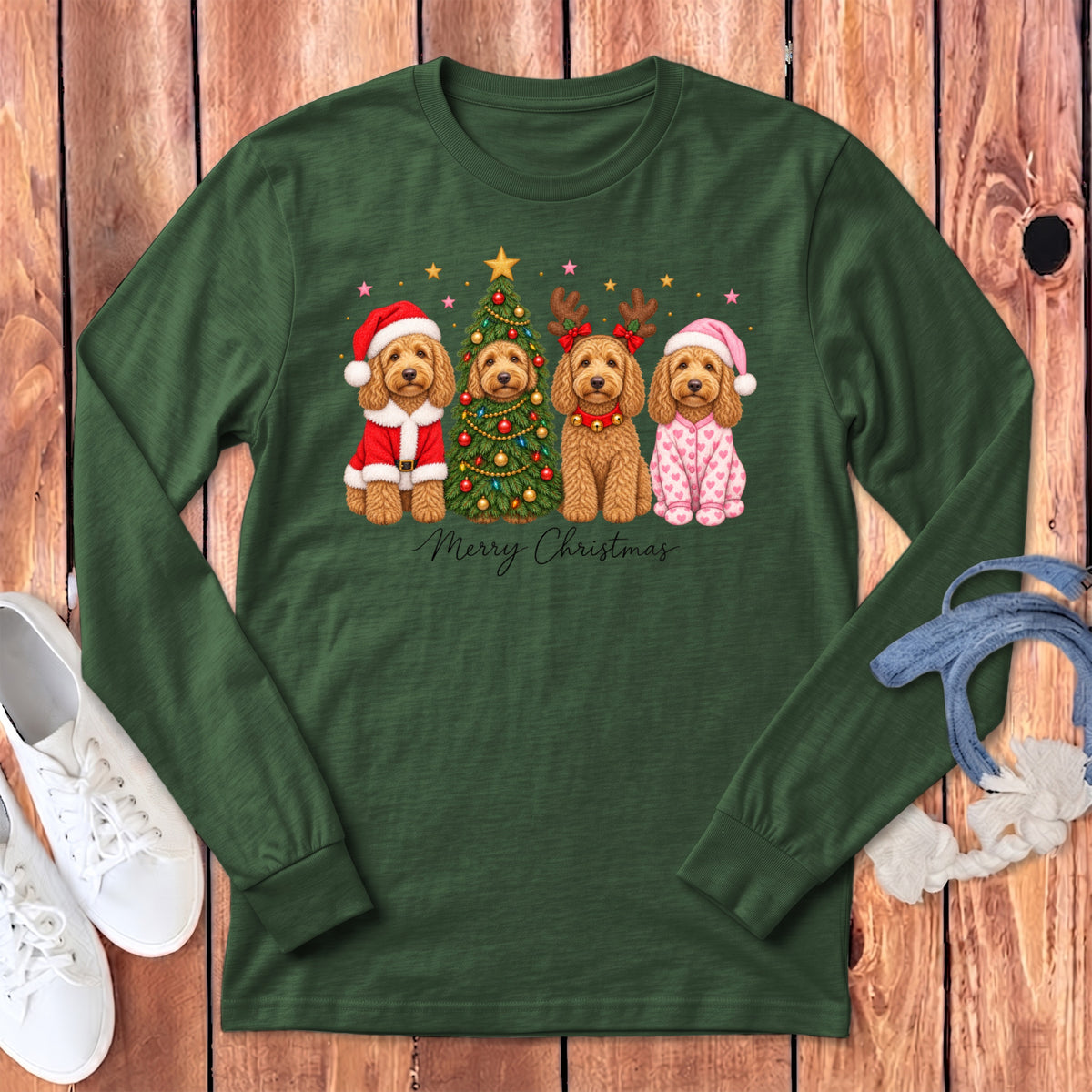 Dark green long-sleeve t-shirt featuring a Christmas graphic of four golden doodles dressed in holiday attire.