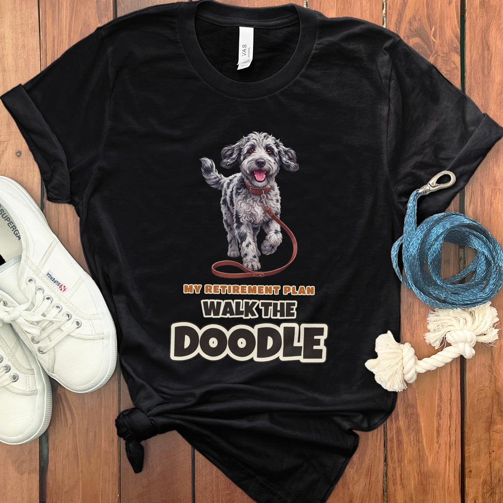 Black t-shirt with a doodle dog illustration and text "MY RETIREMENT PLAN WALK THE DOODLE".