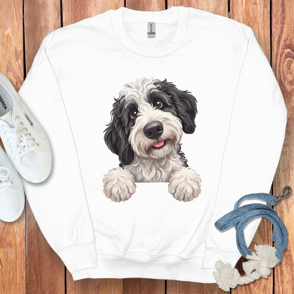 White sweatshirt with a black and white dog graphic.